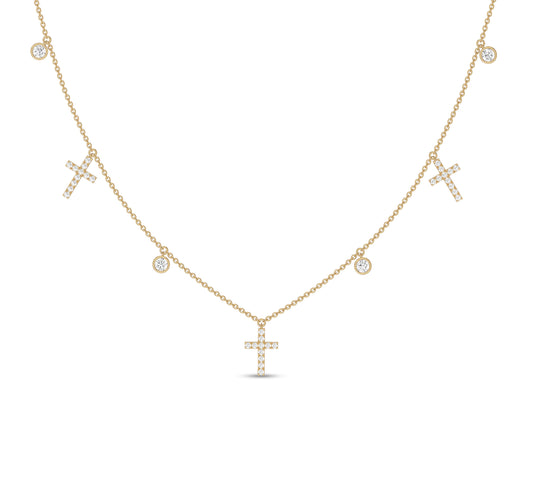 Yellow gold necklace with cross and bezel-set diamonds