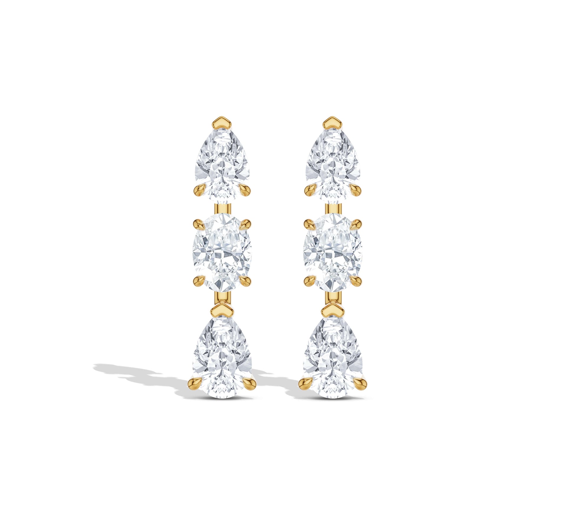 Drop earrings with pear and cushion cut diamonds