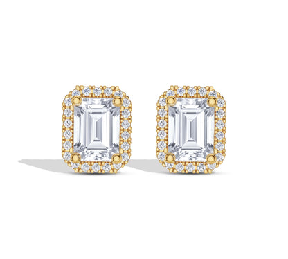 Emerald cut halo diamond earrings in yellow gold