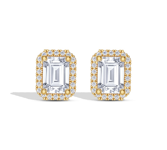 Emerald cut halo diamond earrings in yellow gold