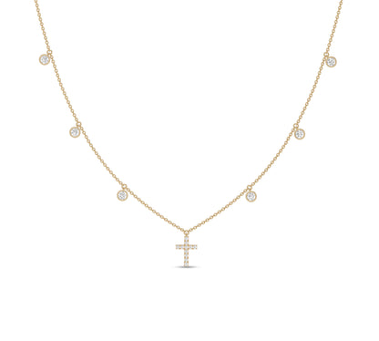 Yellow gold necklace with bezel-set diamonds and cross drop