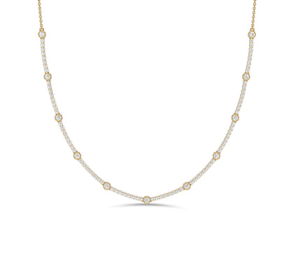 Gold necklace with bezel-set diamonds