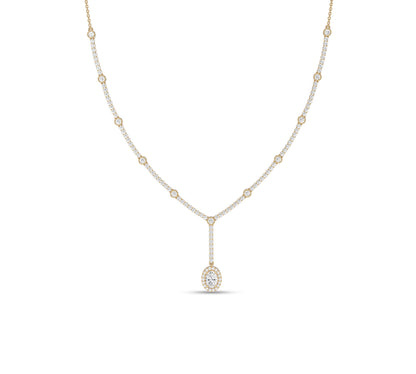 Oval drop diamond necklace with bezel set chain in yellow gold