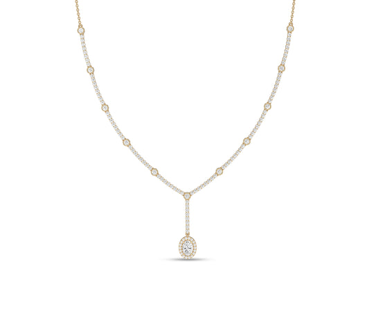 Oval drop diamond necklace with bezel set chain in yellow gold
