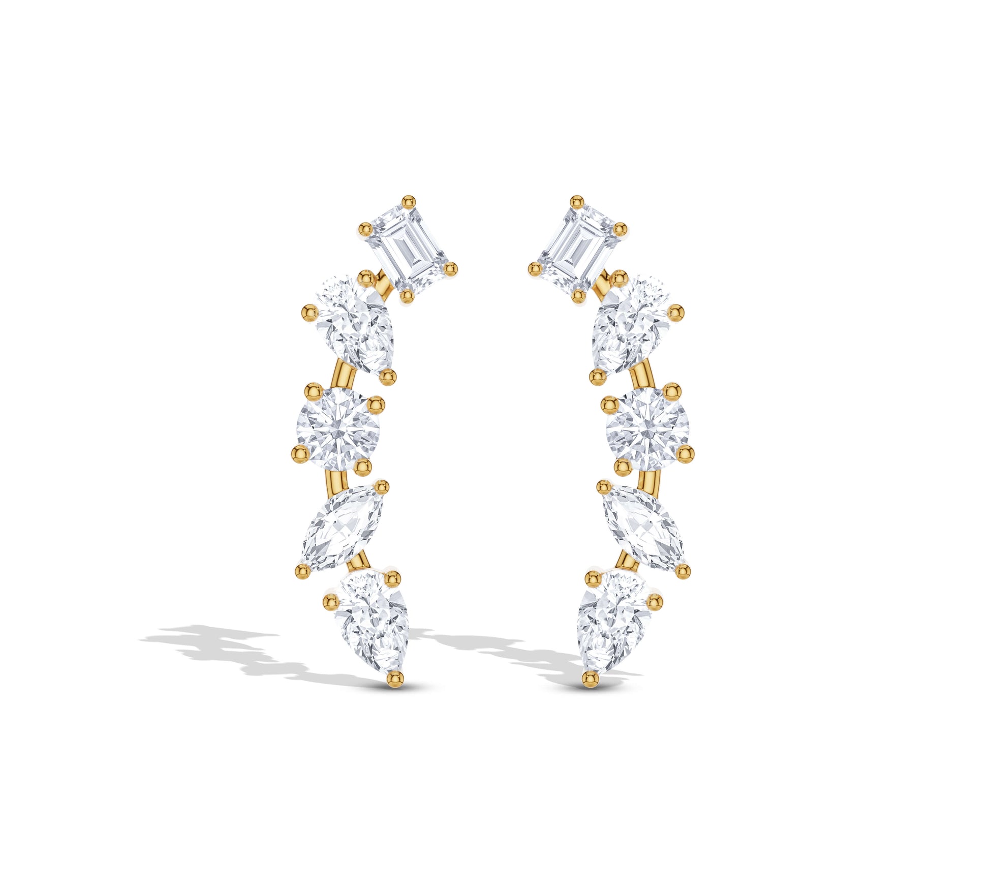 Climber earrings with pear and emerald diamonds