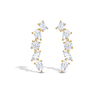 Climber earrings with pear and emerald diamonds
