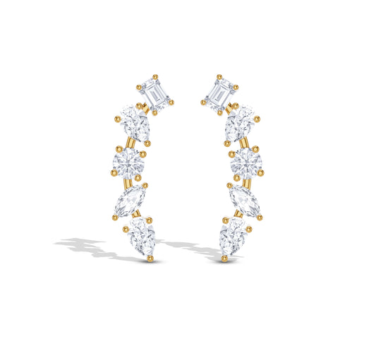 Climber earrings with pear and emerald diamonds