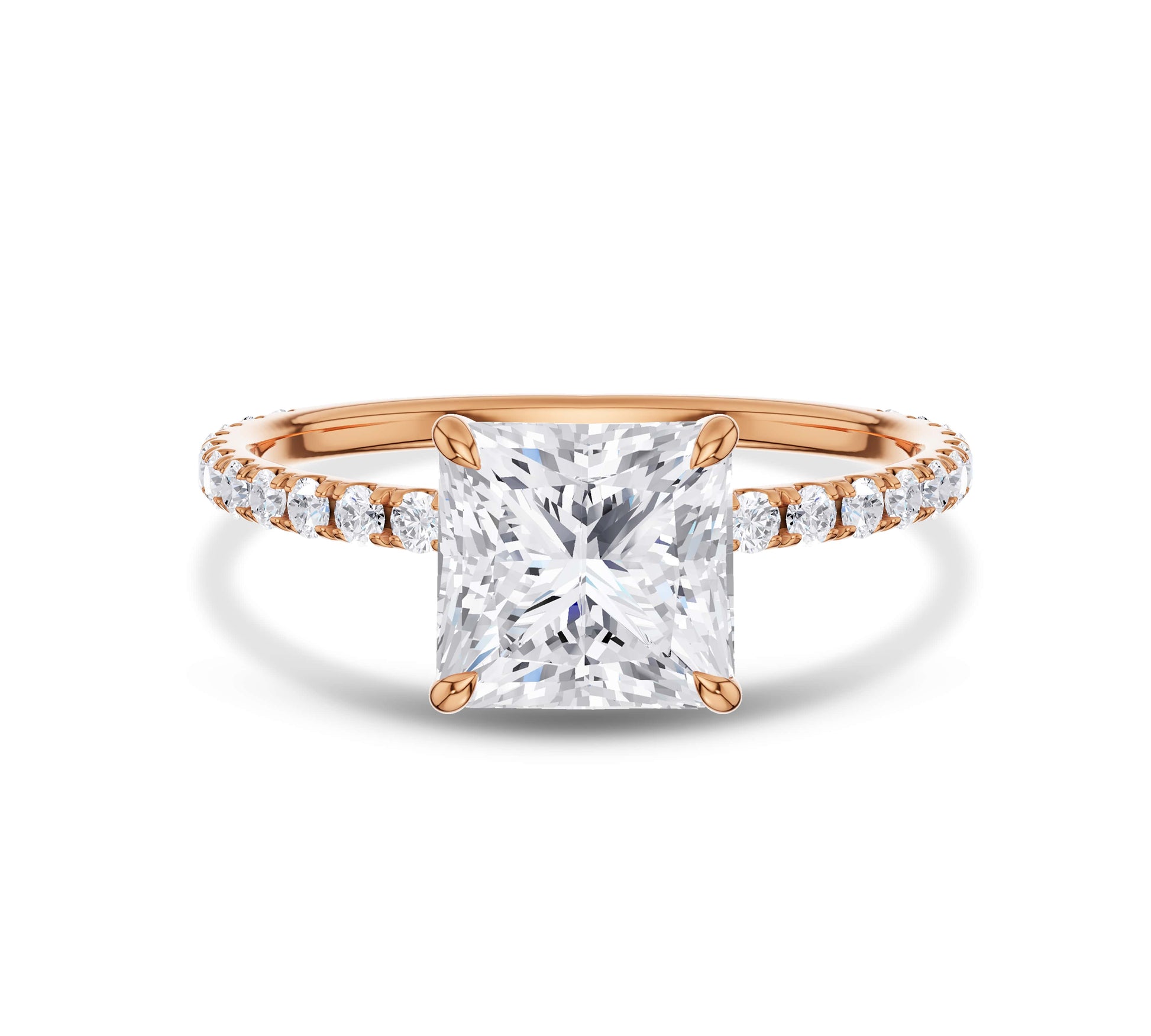 Rose gold pear cut diamond ring with pavé side stones