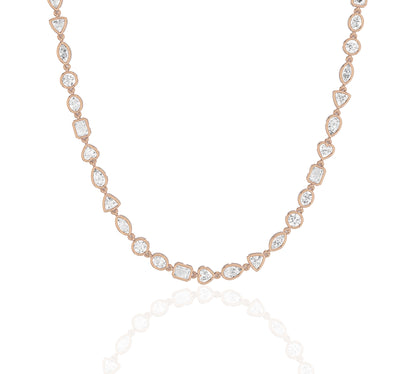 Assorted cut diamonds in modern bezel settings