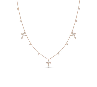 Rose gold cross necklace with pear-shaped diamonds