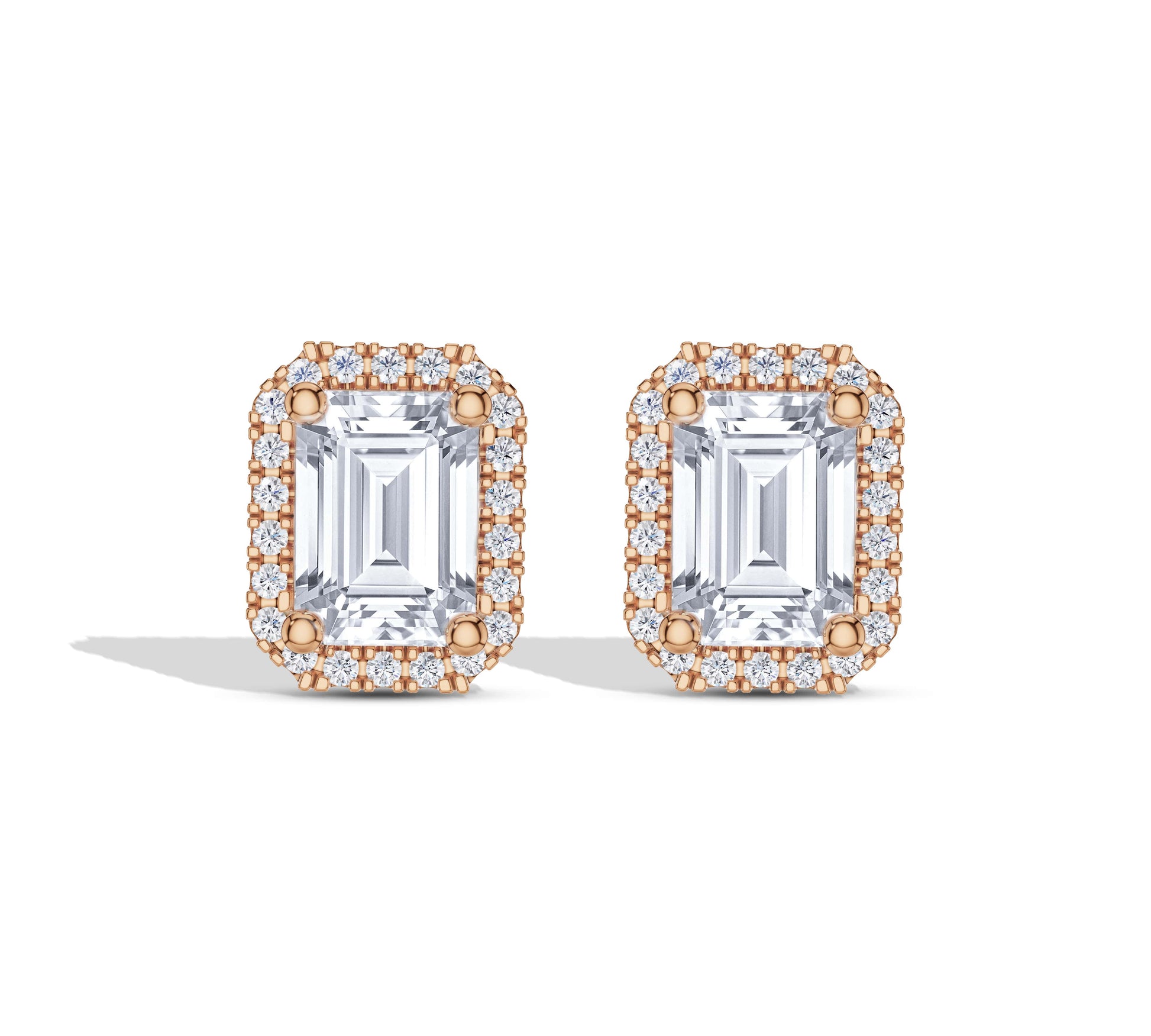 Vintage-inspired emerald diamond stud earrings