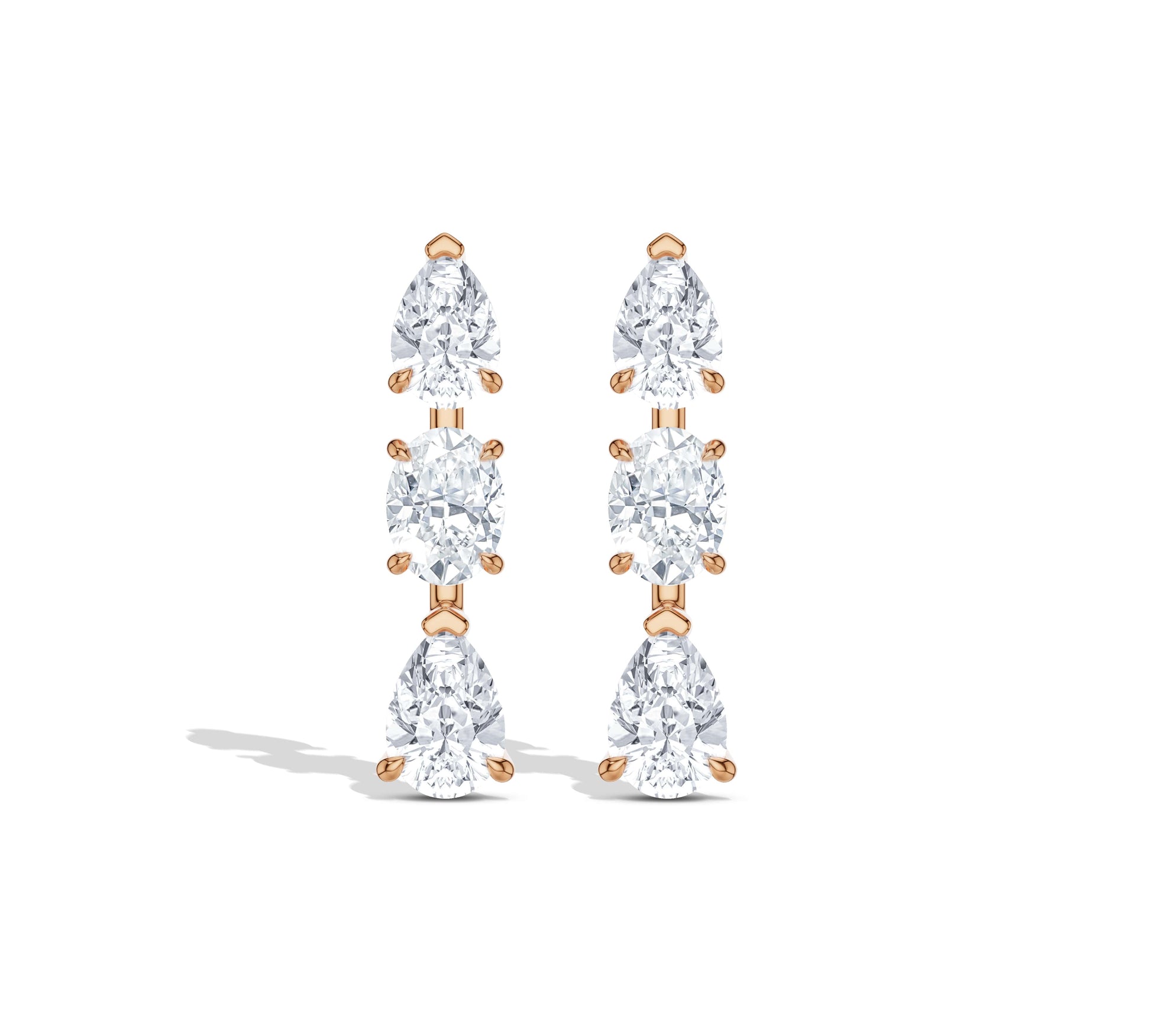 Long pear-cut and oval diamond earrings
