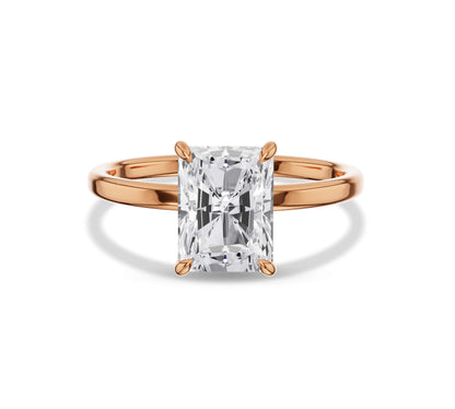 Bold rectangular diamond set in a solitaire gold band