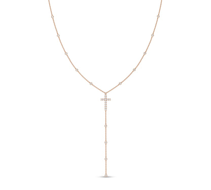 Long drop cross necklace with diamonds