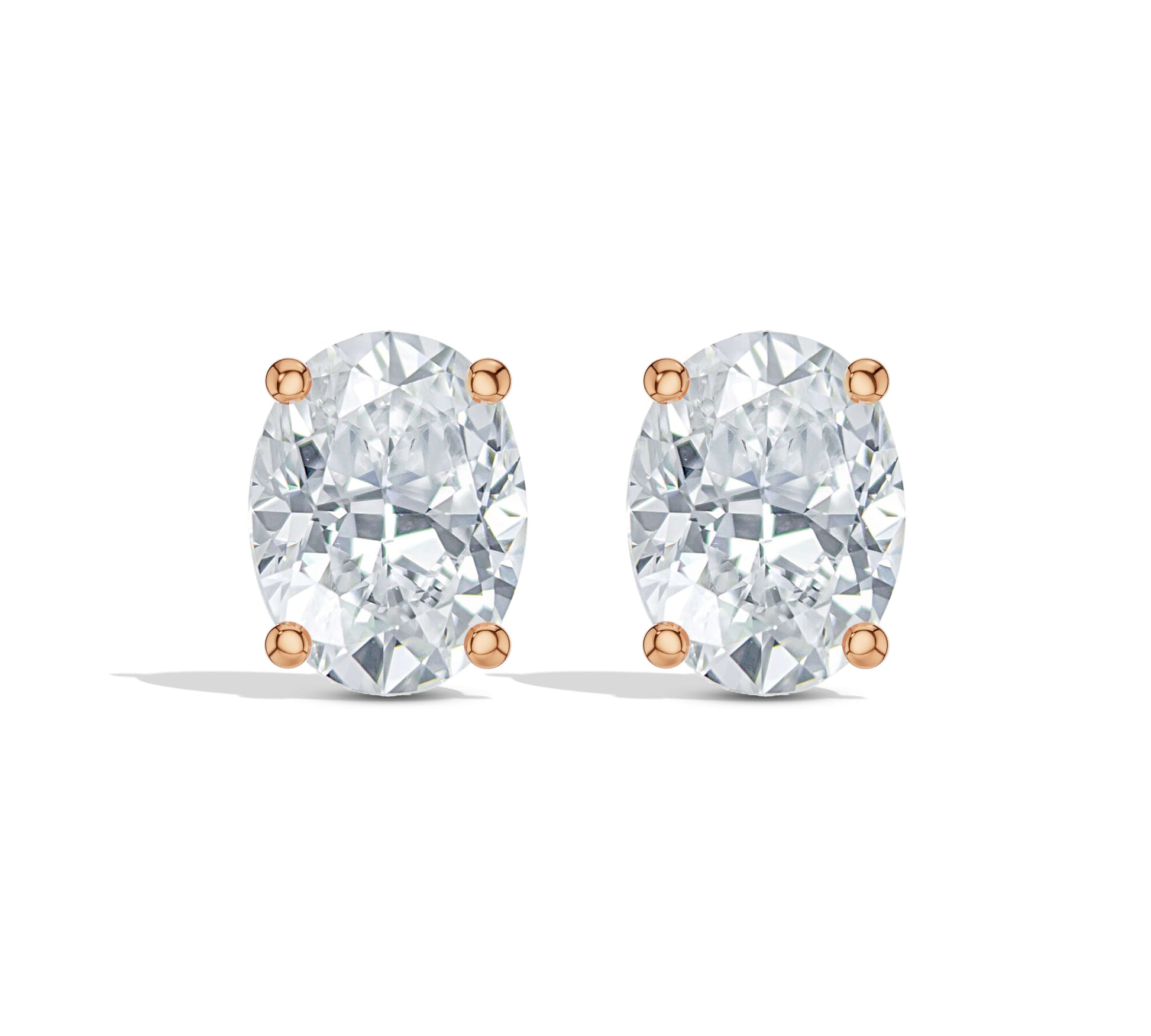 Solitaire diamond earrings in gold