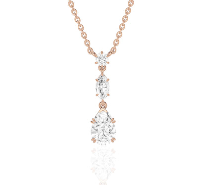 14K rose gold necklace featuring trio of round-cut diamonds