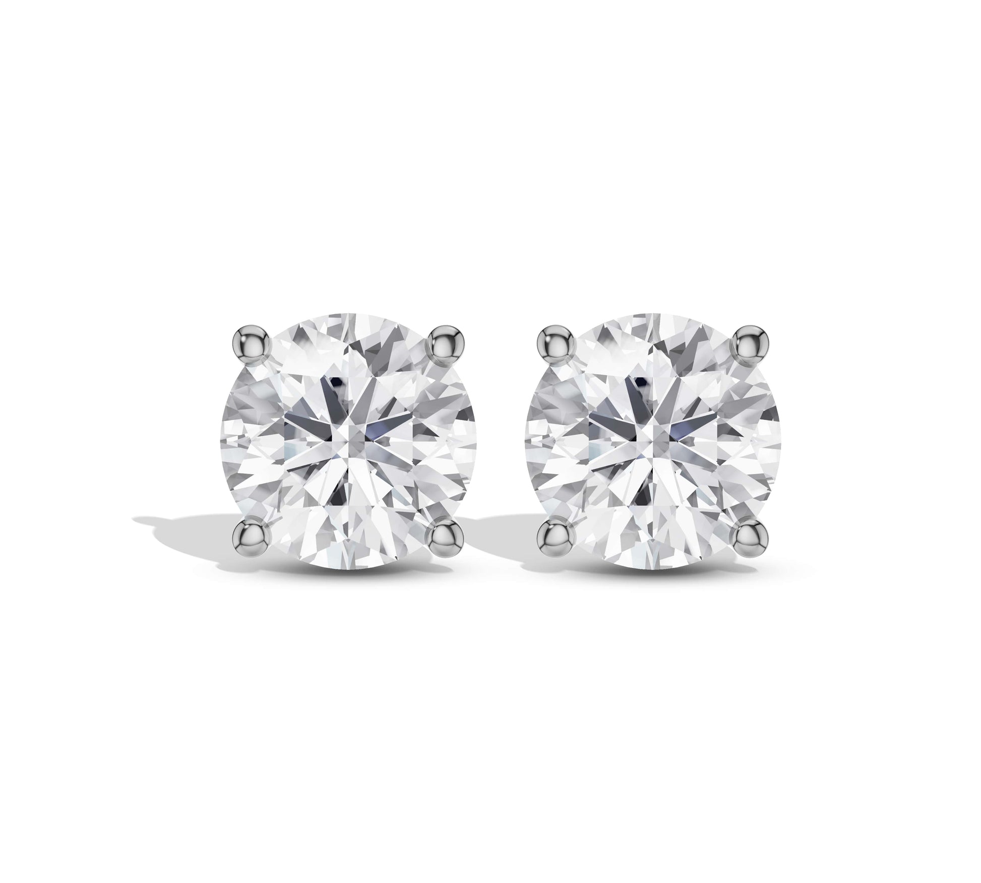Round moissanite diamond earrings in classic four-prong setting