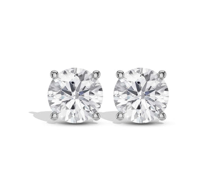 Round moissanite diamond earrings in classic four-prong setting