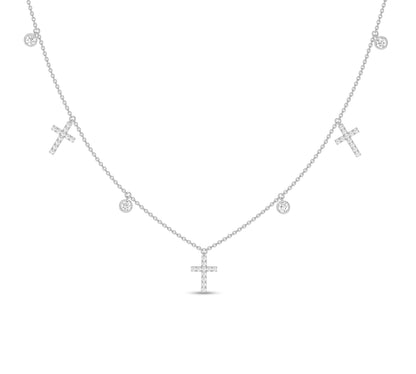 White gold cross charm necklace with bezel-set diamonds