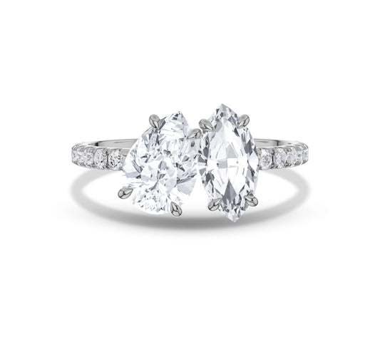 White gold marquise and pear diamond ring with pave accents