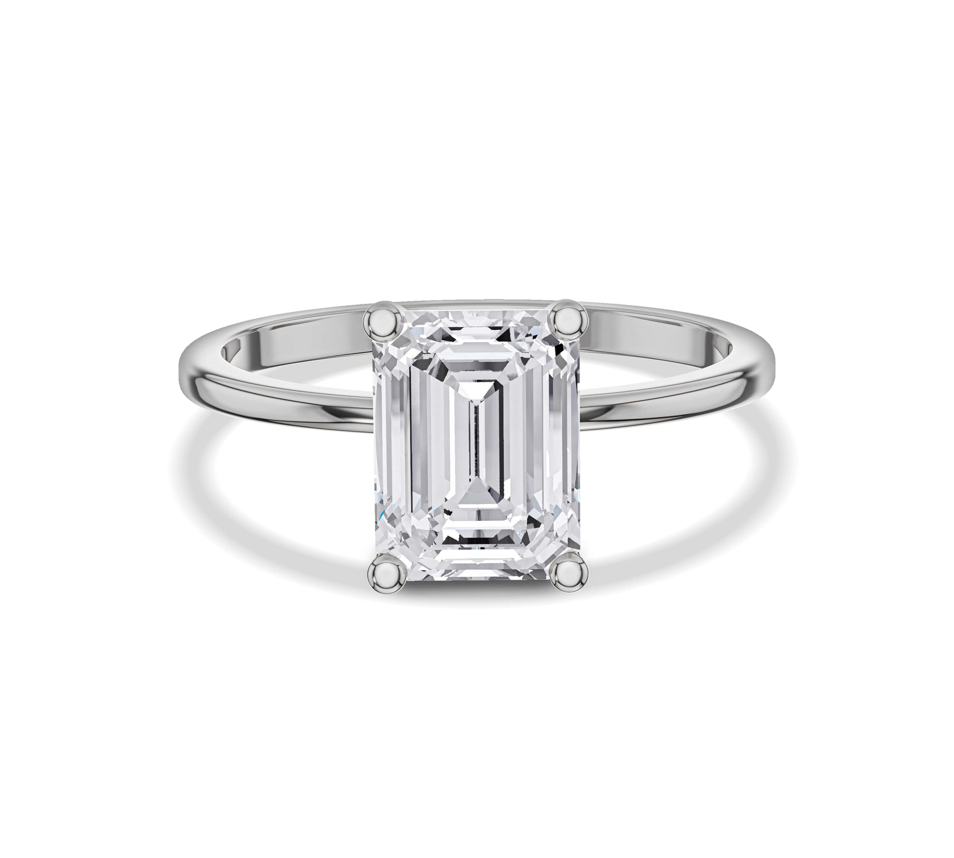 engagement ring with emerald solitaire