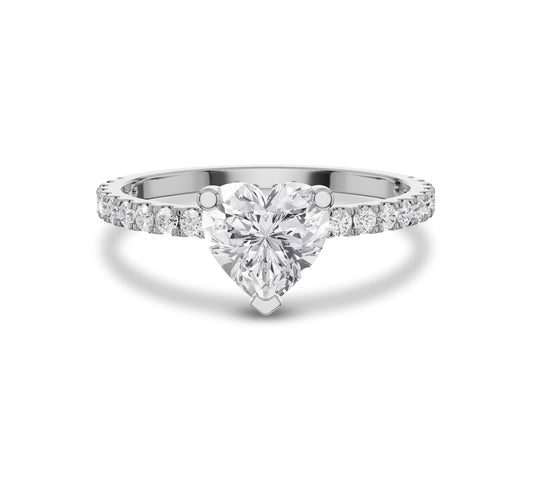 Heart shaped diamond ring in white gold pavÃ© setting