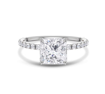 White gold pear cut diamond engagement ring with pavé diamonds