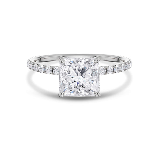 White gold pear cut diamond engagement ring with pavÃ© diamonds