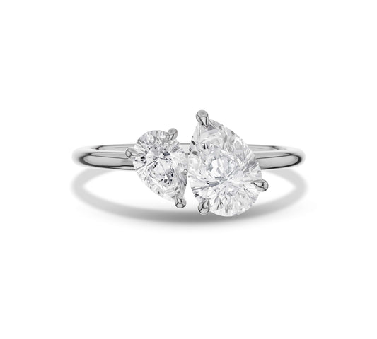 White gold asymmetric ring with pear shaped lab grown diamonds