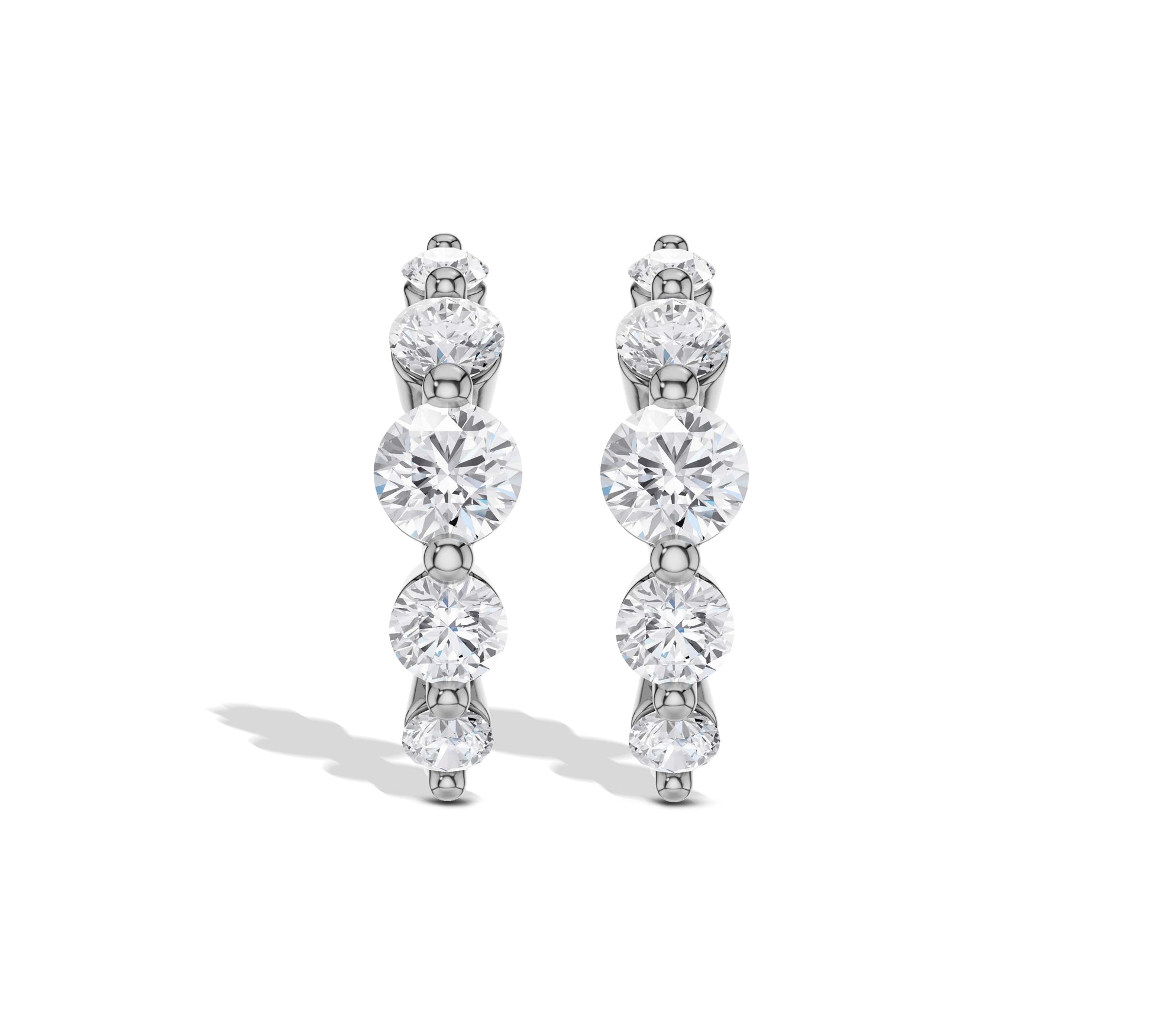 Rose gold graduated diamond curve hoop earrings