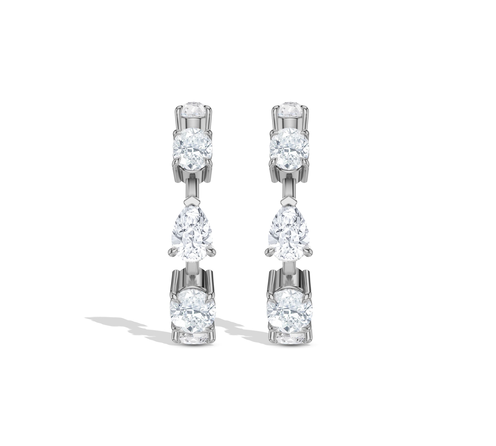 Intricate 14k gold hoop earrings with sparkling diamonds