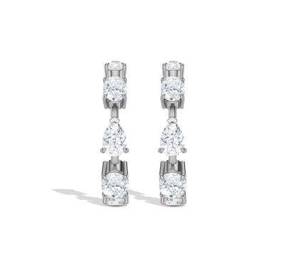 Intricate 14k gold hoop earrings with sparkling diamonds