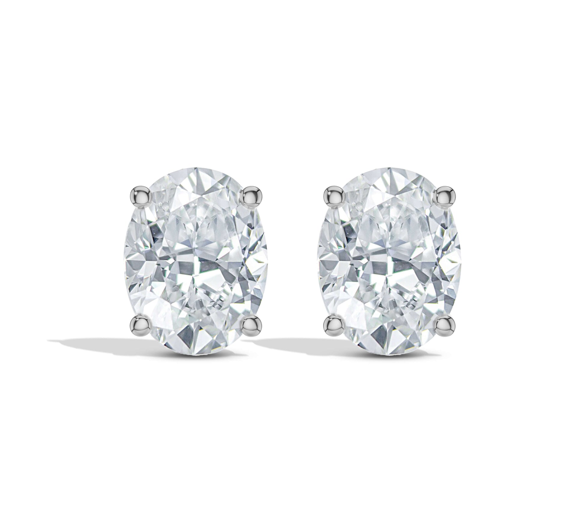  Four-prong white gold diamond studs